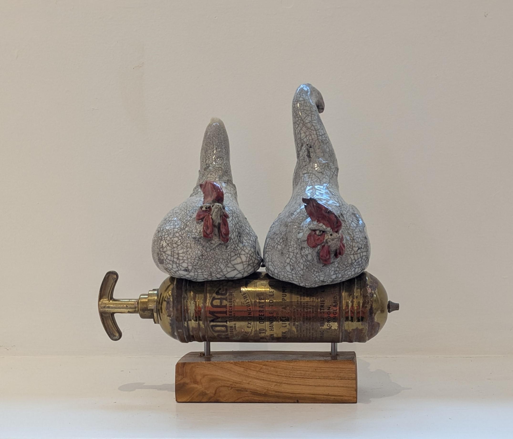 Double Chix on Antique Fire Extinguisher
